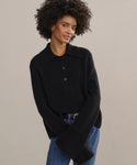 Relaxed knit polo with wide sleeves, ribbed trimmings and three buttons.