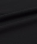 Close-up of the Crosby Tee’s premium jersey cotton fabric, highlighting its smooth texture, gentle folds, soft shadows, and matte finish—ideal for the tee’s relaxed fit.