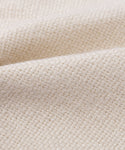 Close-up of the Fabric Swatch Beige Hemp, featuring a textured, grid-like pattern and gentle folds—ideal for upholstery like the Dume Sofa.