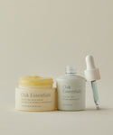 The Hydration Heroes from Oak Essentials: an open jar of Moisture Rich Balm and a Ritual Oil bottle with dropper, elegantly set against a neutral background for effortless skincare.