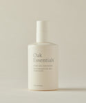 A white bottle of Pure Gel Cleanser with a pump, minimalist gray text on the front, set against a neutral beige background—your go-to gel cleanser for a clarifying clean and brighter complexion.