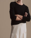 Thumbnail for video: Model wearing long sleeve slim tee in black.