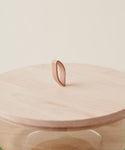 The Stowe Eco Glass Bowl features a round wooden lid with a leaf-shaped handle, crafted from FSC certified wood, making it a sustainable addition to your kitchen.