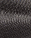 Close-up of the Miramar Sofa Slipcover in dark gray textured fabric featuring a visible woven pattern and a subtle horizontal ridge—ideal for adding a touch of sophistication to your sofa.