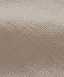 Close-up of the Sunset Dining Arm Chair Slipcover in textured off-white alabaster linen, featuring a grid-like pattern and soft folds that highlight the natural fibers—ideal for adding an elegant touch to your dining space.
